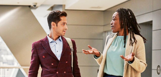 photo of two people in conversation 